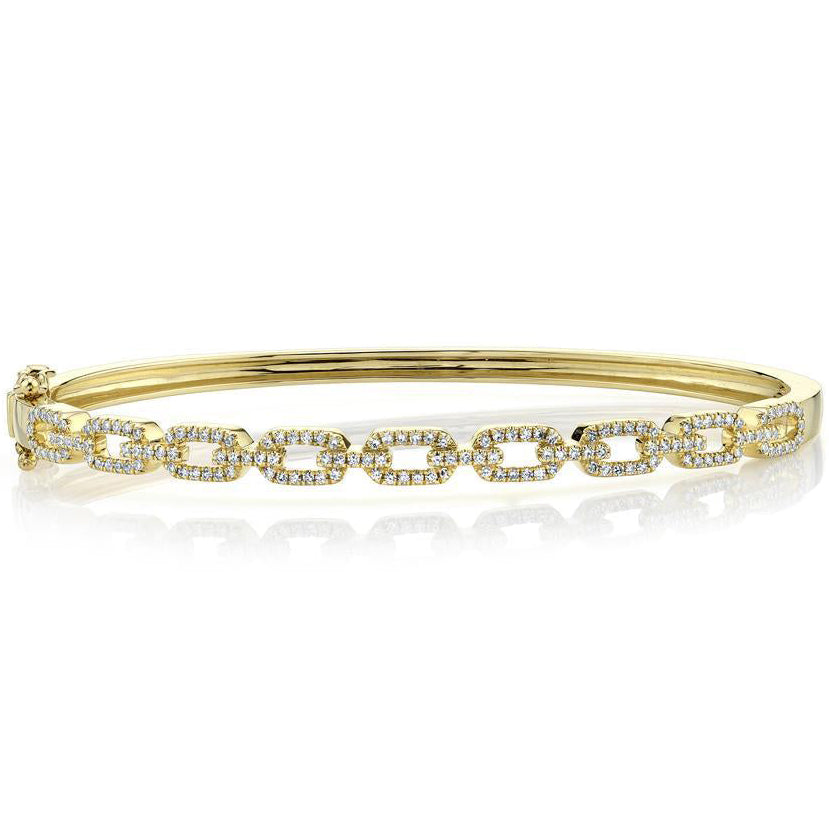 Yellow gold bracelet with diamonds on white background