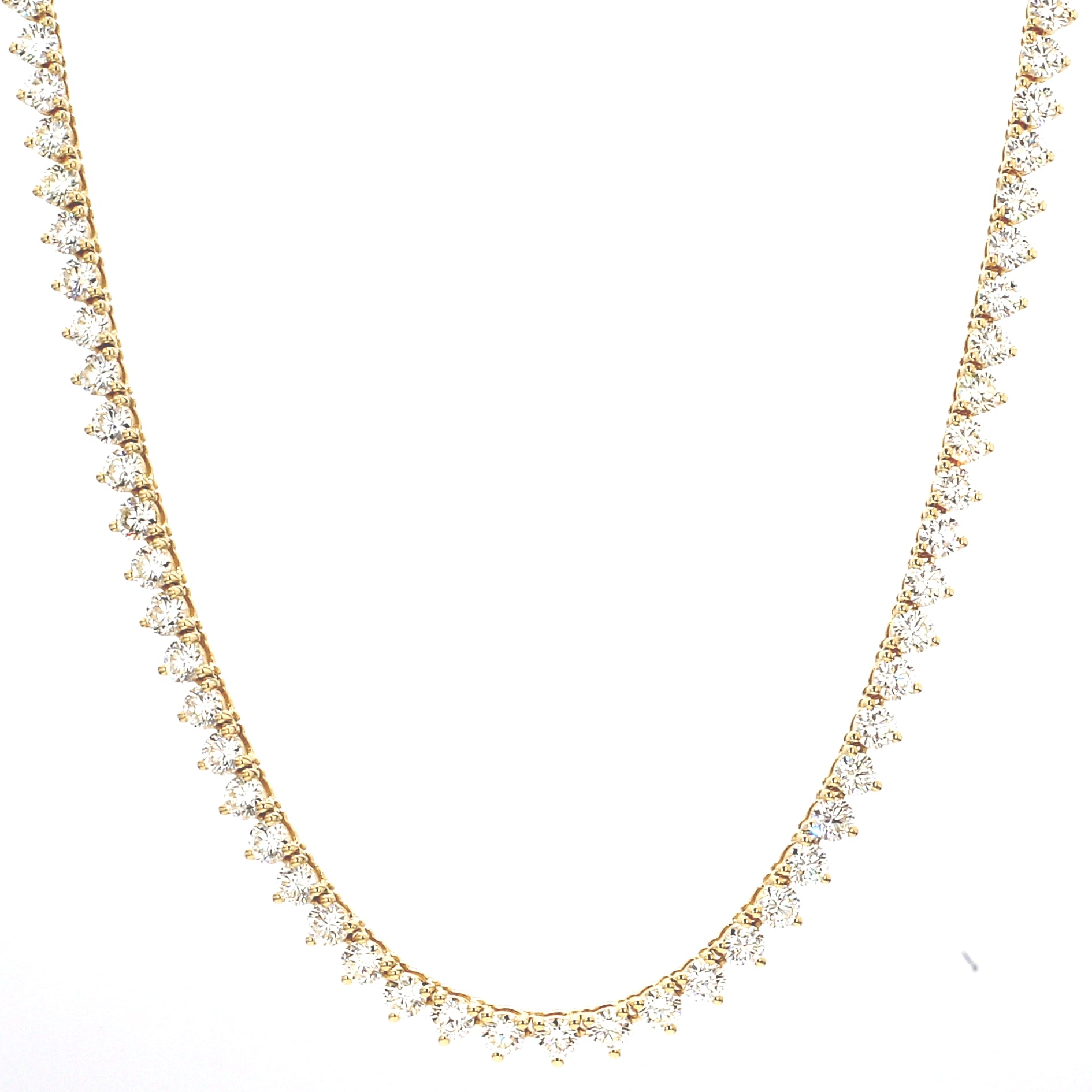 Gold diamond necklace on white background