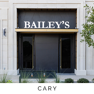 storefront with 'Bailey's' sign on a building facade