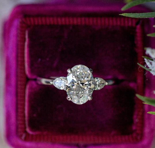 oval diamond ring in purple box