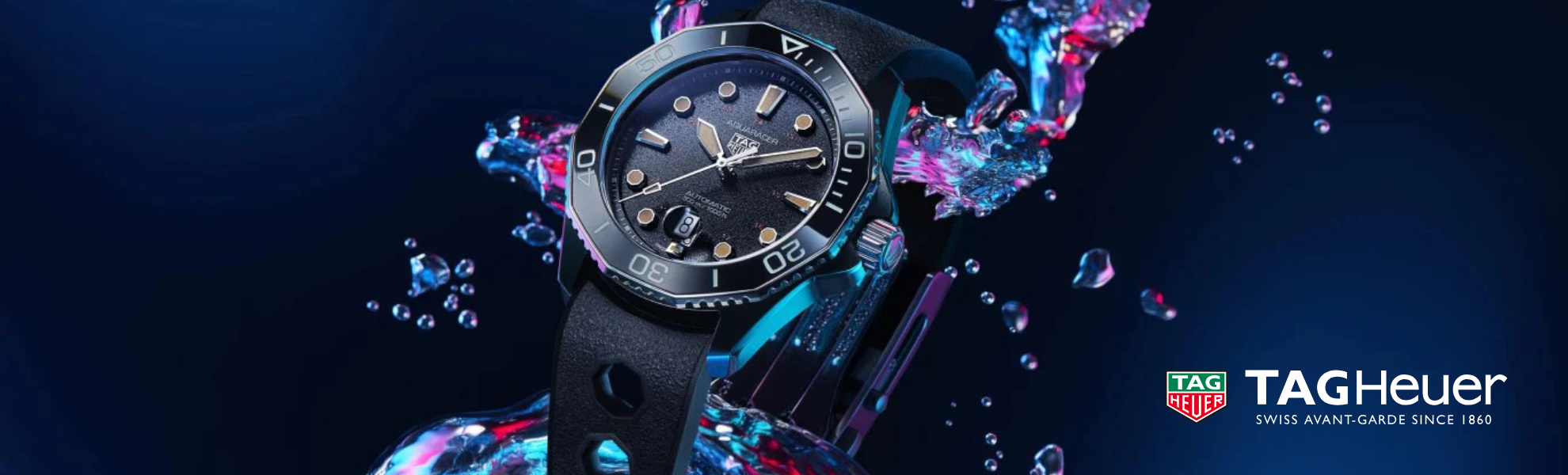 TagHeuer watch surrounded by water droplets on a dark background