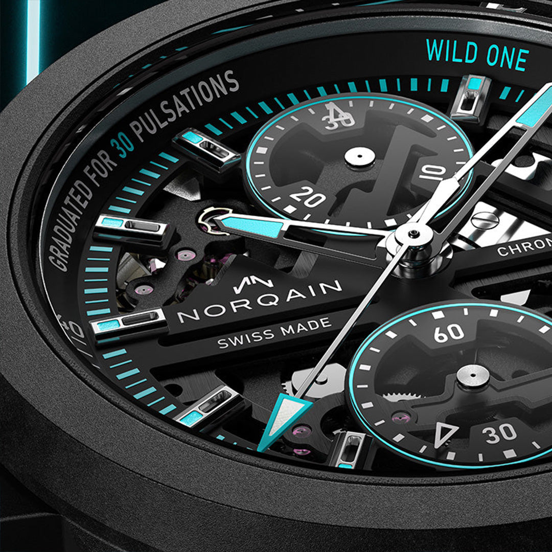 Close-up of a Norqain watch with black and turquoise details
