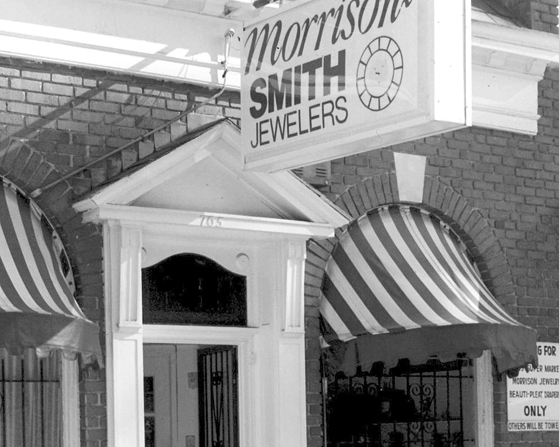 storefront with 'Morrison Smith Jewelers' sign and striped awnings