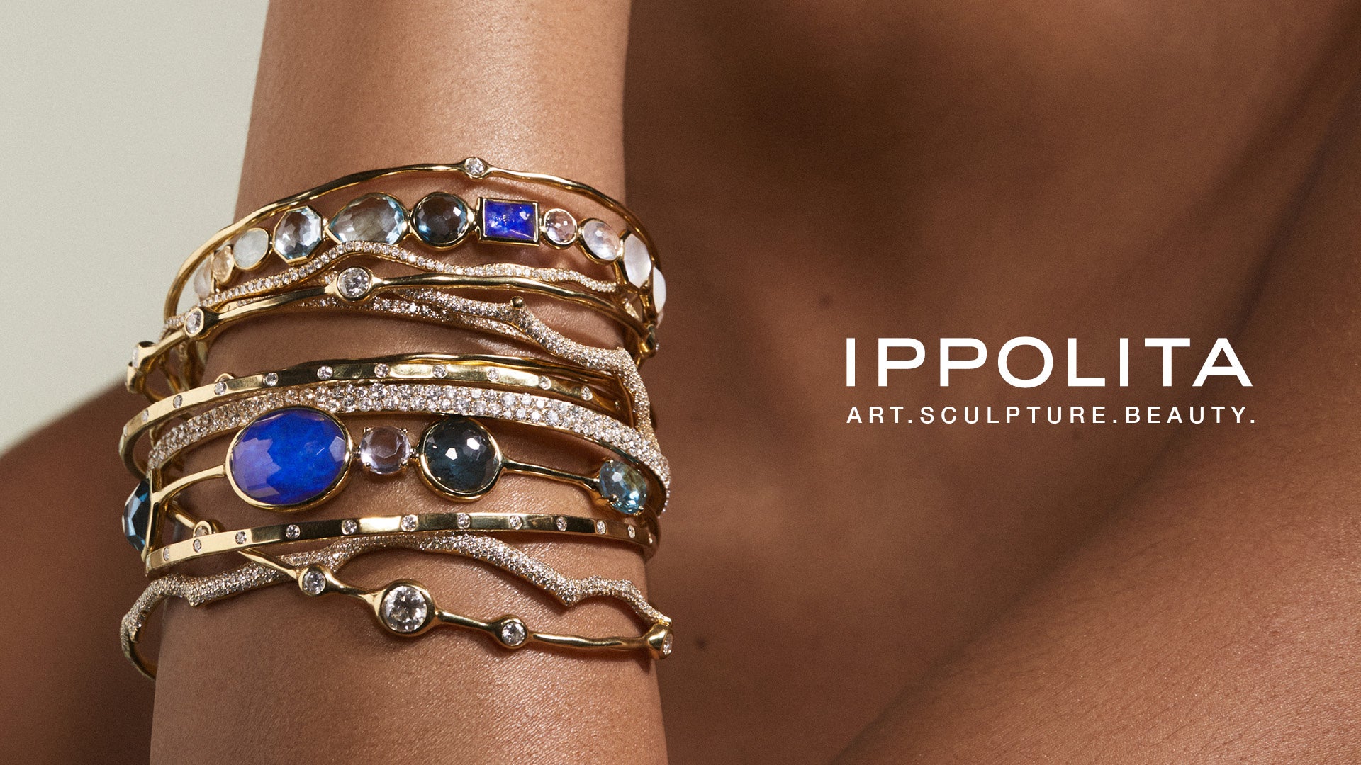 Ippolita jewelry on a wrist with brand name displayed