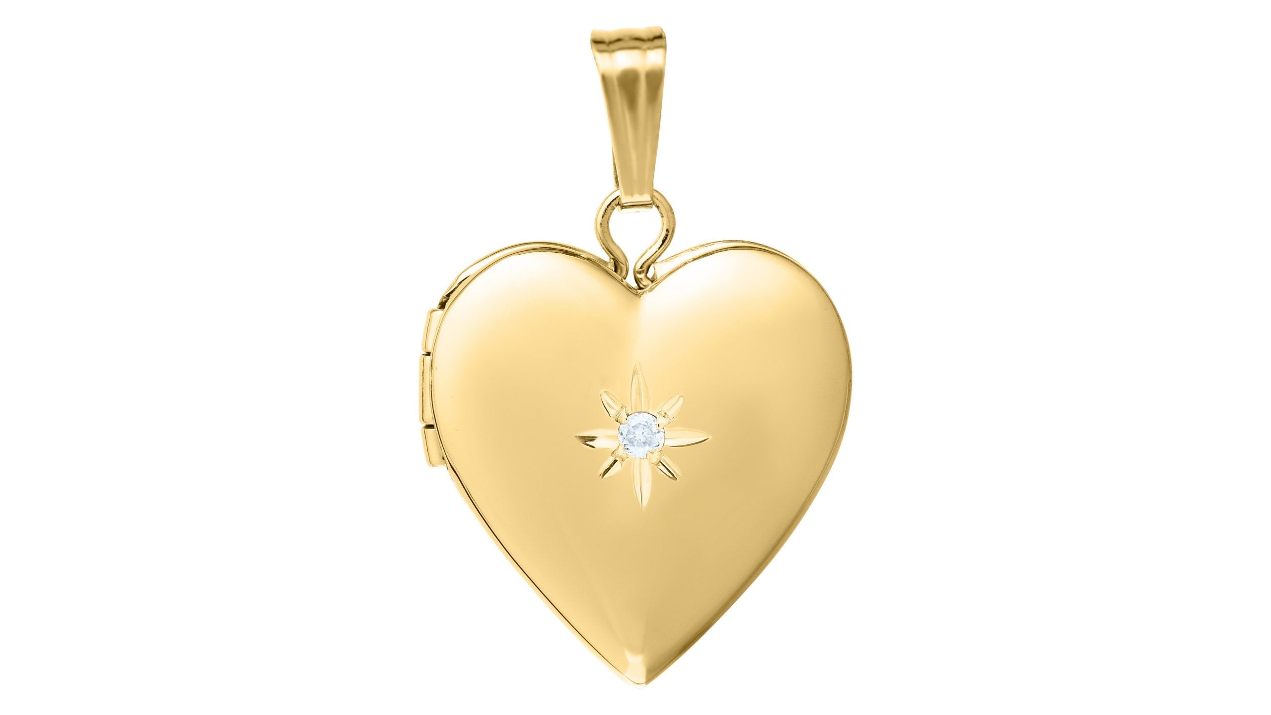 Gold heart-shaped locket with a central gemstone on a white background