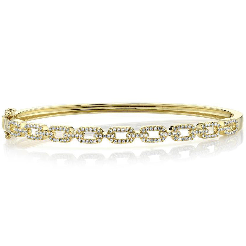 Yellow gold bracelet with diamonds on white background