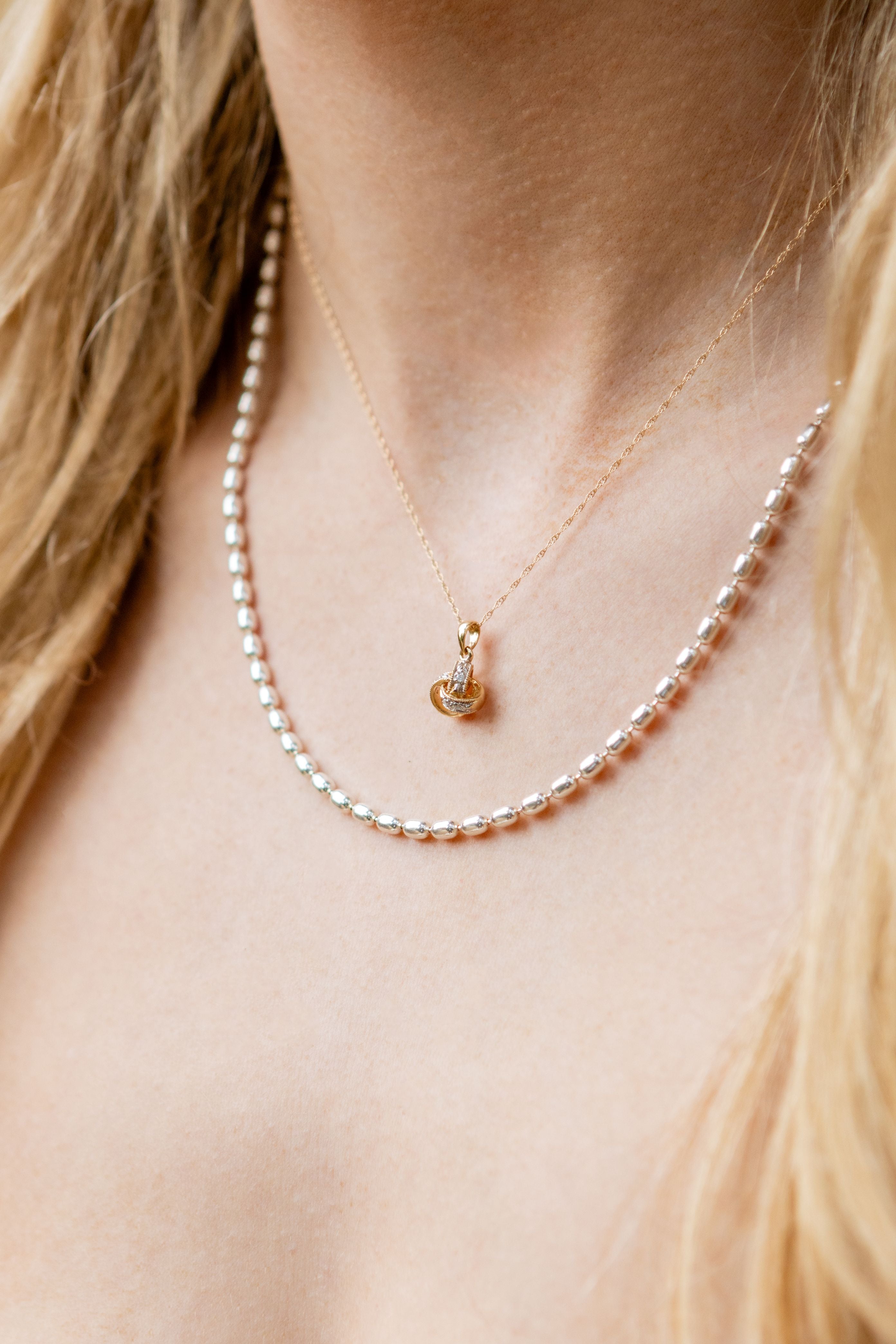 Diamond Love Knot Pendant Necklace in 14K Yellow Gold