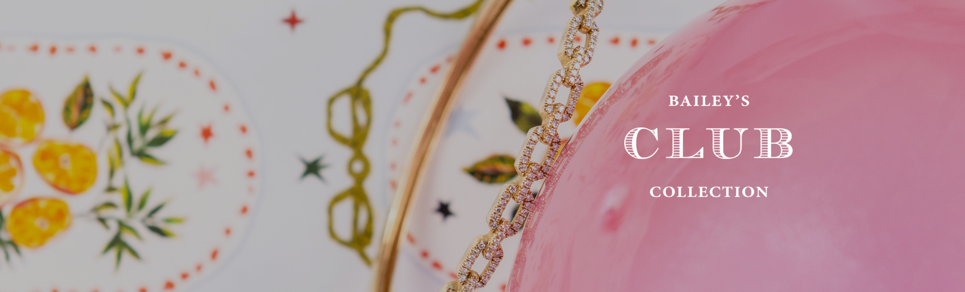 Necklace on a decorative plate with 'Bailey's Club Collection' text