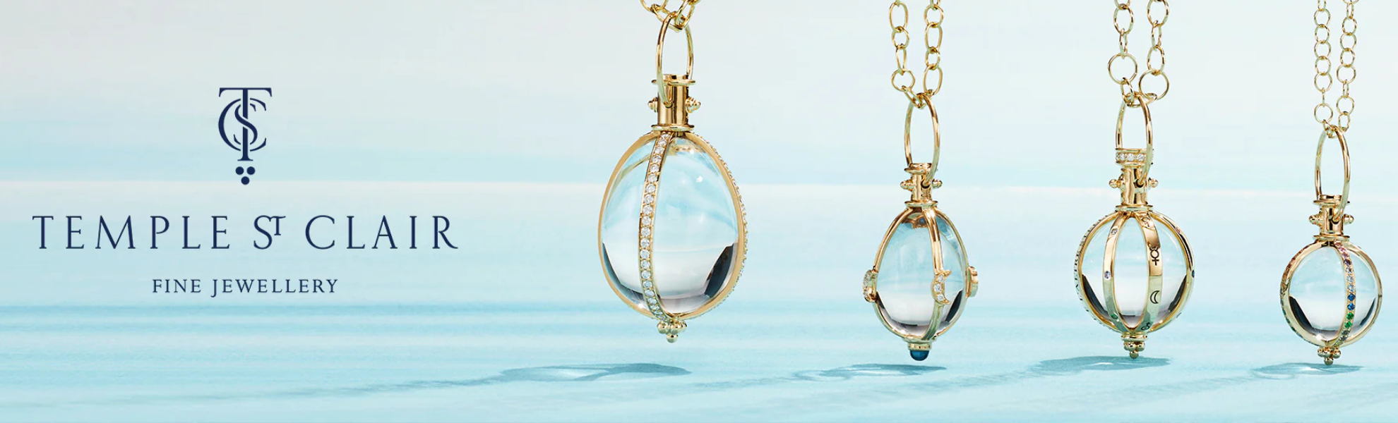 Three gold necklaces with pendant stones on a light blue background, featuring Temple St. Clair branding.
