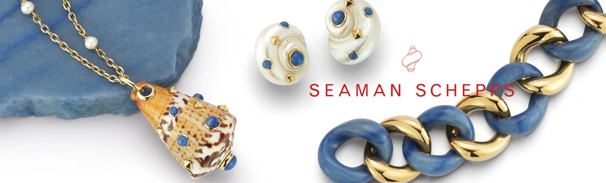 Jewelry set with blue and gold accents featuring Seaman Schepps branding.