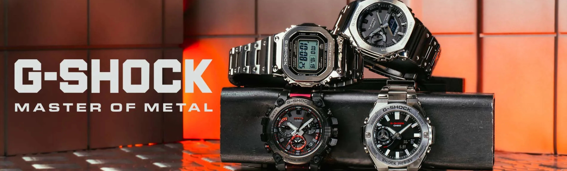 G-Shock watches displayed with a metallic finish on an orange and brown gradient background.