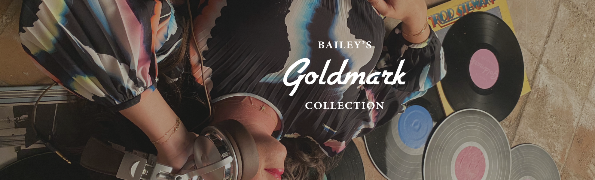 Person wearing colorful pants with 'Bailey's Goldmark Collection' text overlay.
