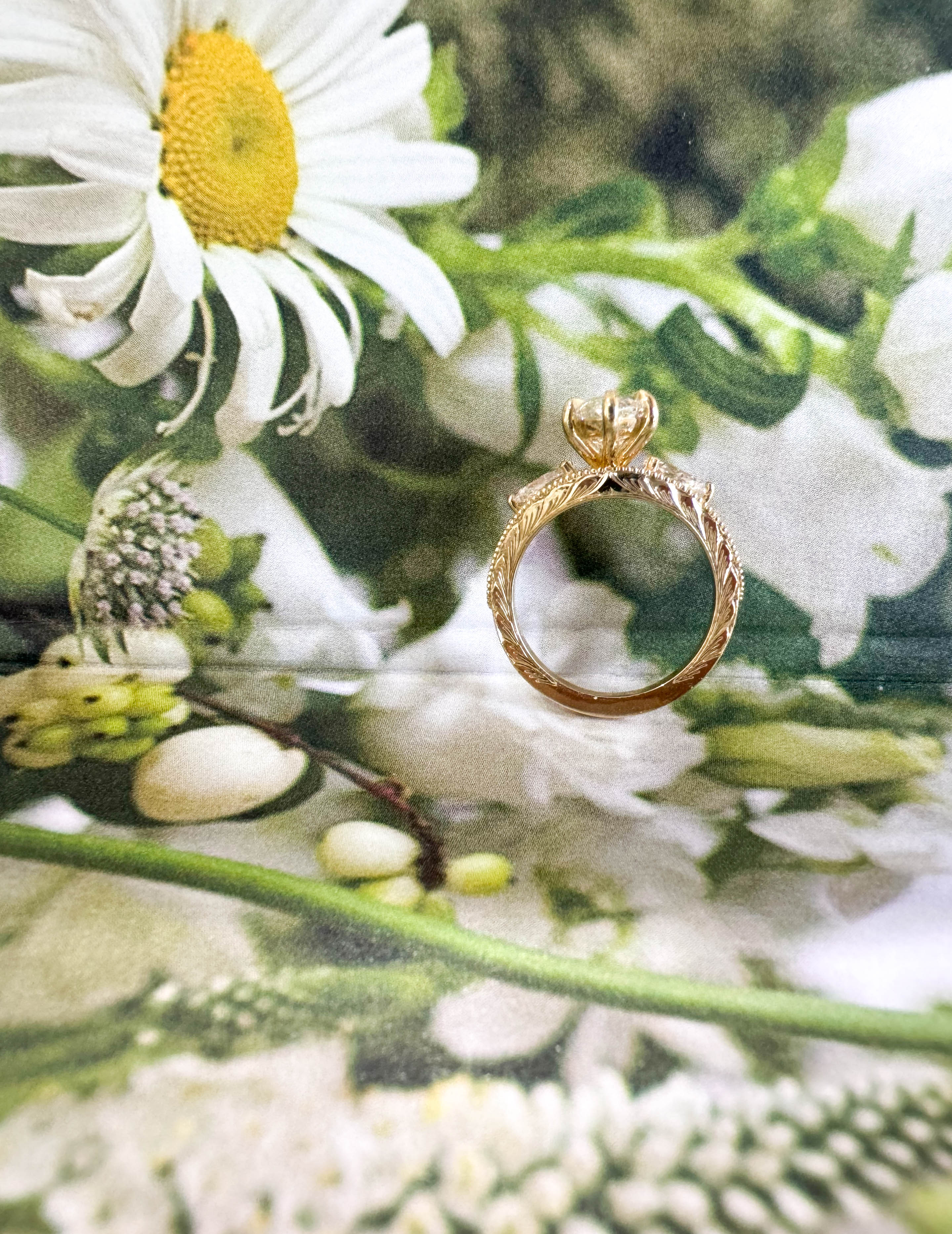 Gold ring on a floral background