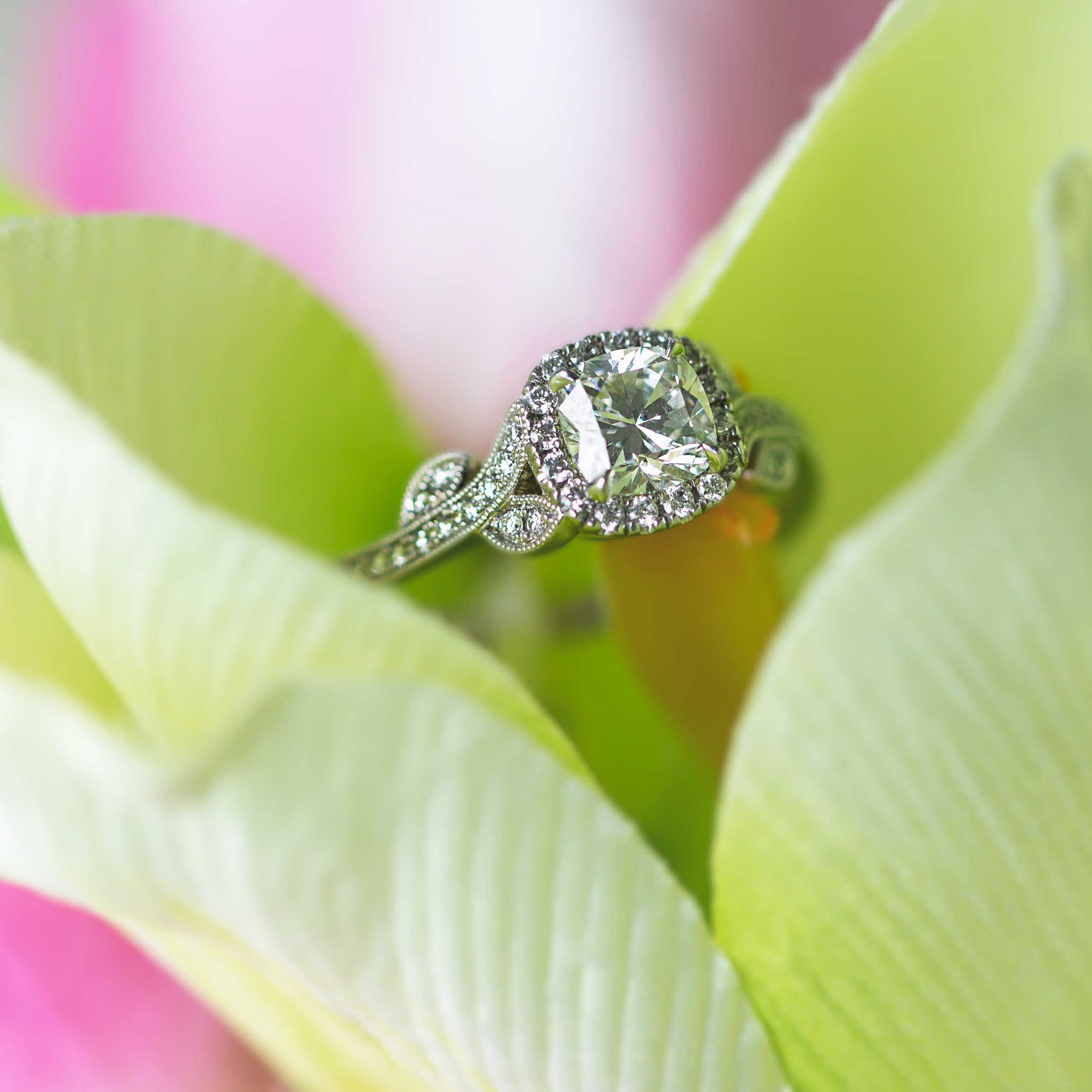Diamond ring on a colorful floral background