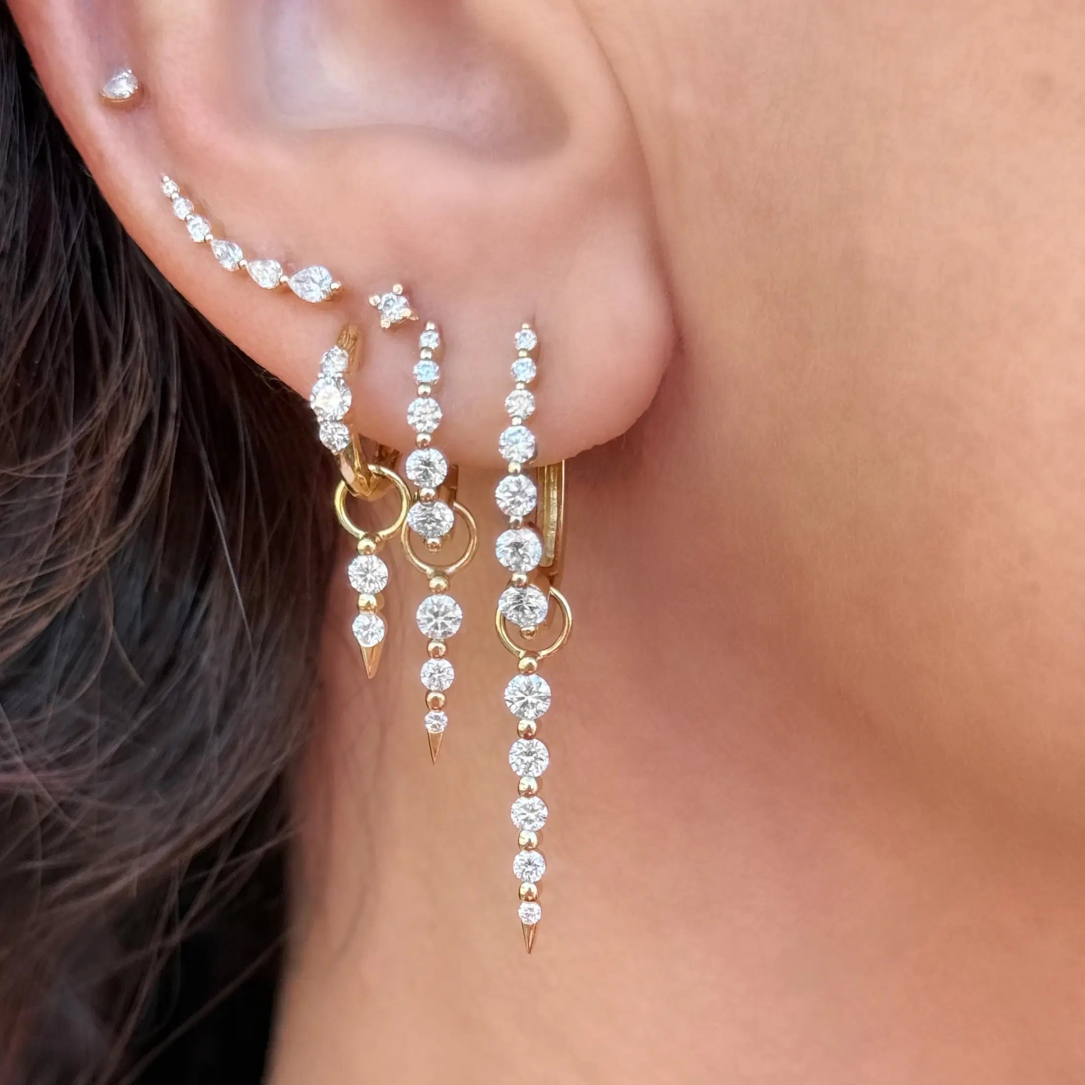 Three Stories Large Oval Graduated Diamond Hoop Earrings in 14K Yellow Gold