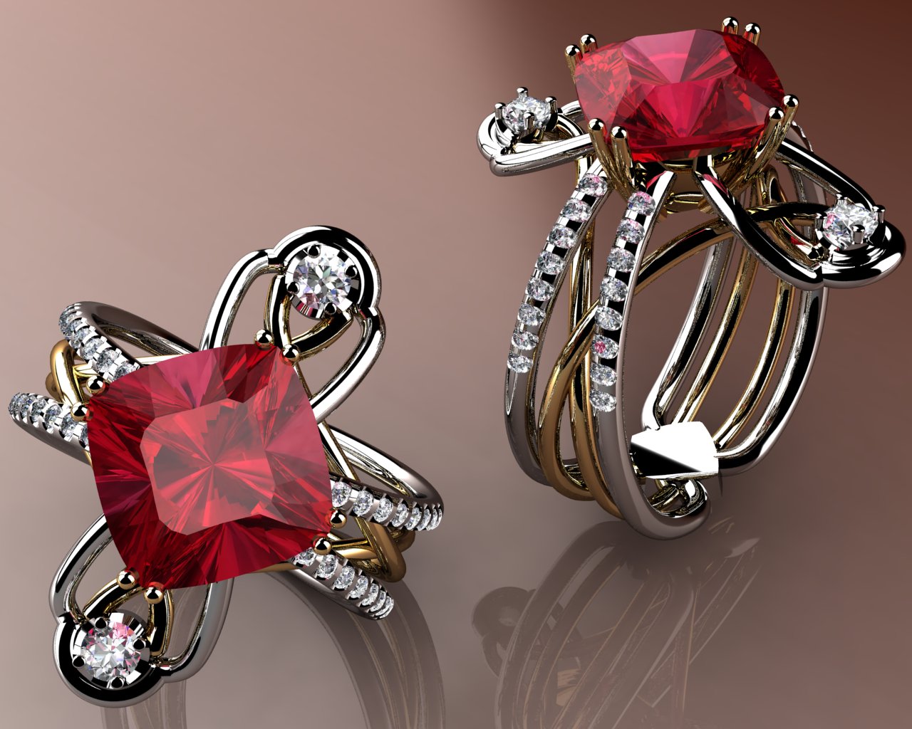 Pair of gold rings with red gemstones and diamond accents on a reflective surface.