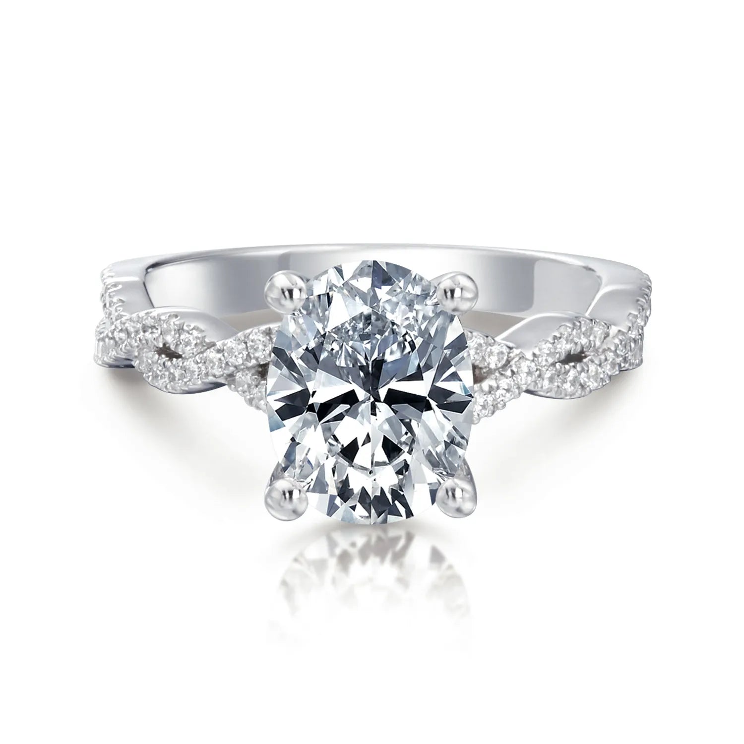 Silver ring with a large diamond and smaller diamonds on the band against a white background
