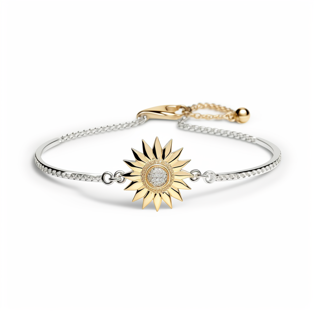 Gold and silver bracelet with sunflower design on a white background